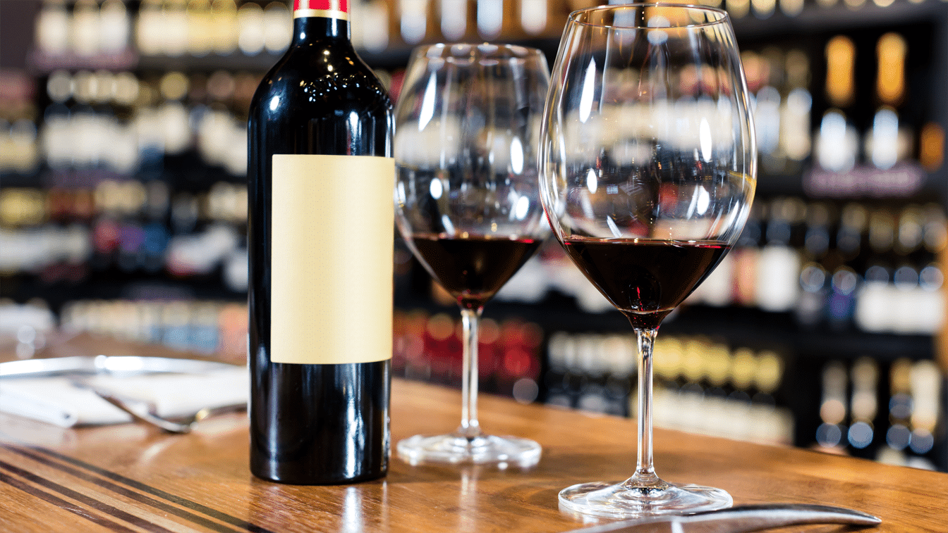 High end wine on table with glasses