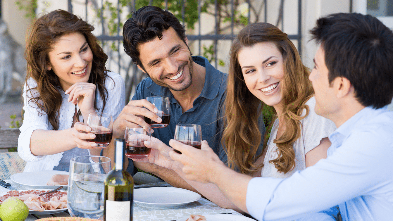 Friends enjoying a summer day with wine